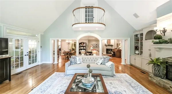 a room with furniture and a chandelier