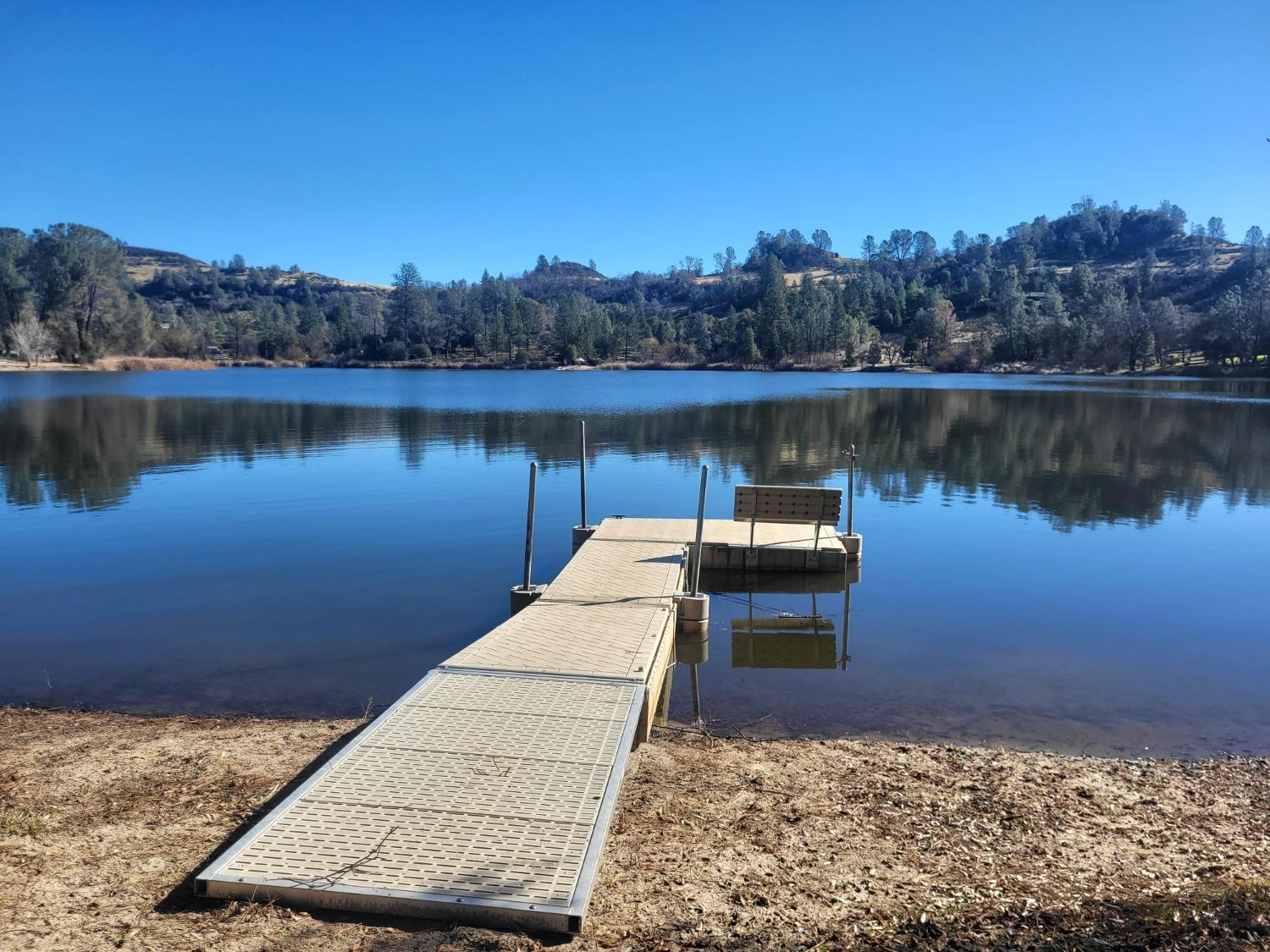 a view of a lake with a mountain in the background