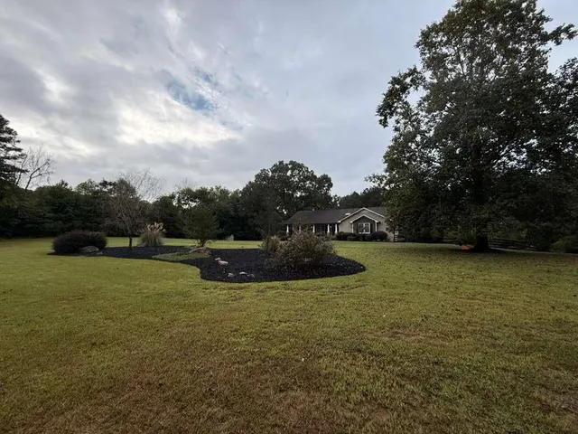 a view of a lake in front of house