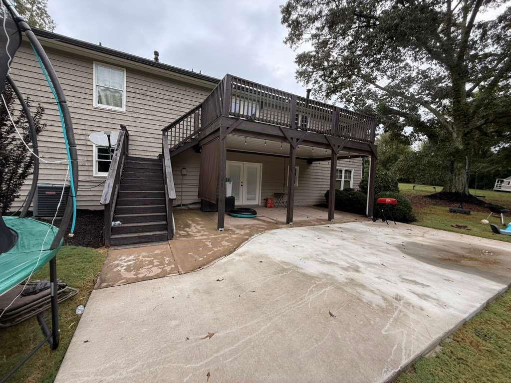 1463 Kellogg Creek Road Acworth, GA 30102 - Photo 11 of 55 a front view of a house with a yard