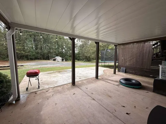 a view of a backyard of a house
