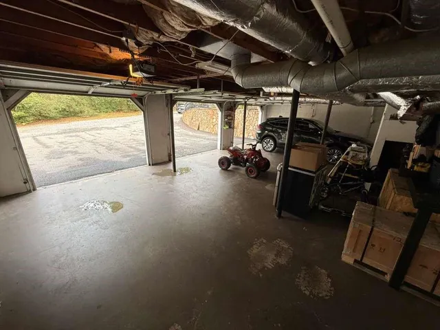 a bathroom with a granite countertop toilet sink and shower
