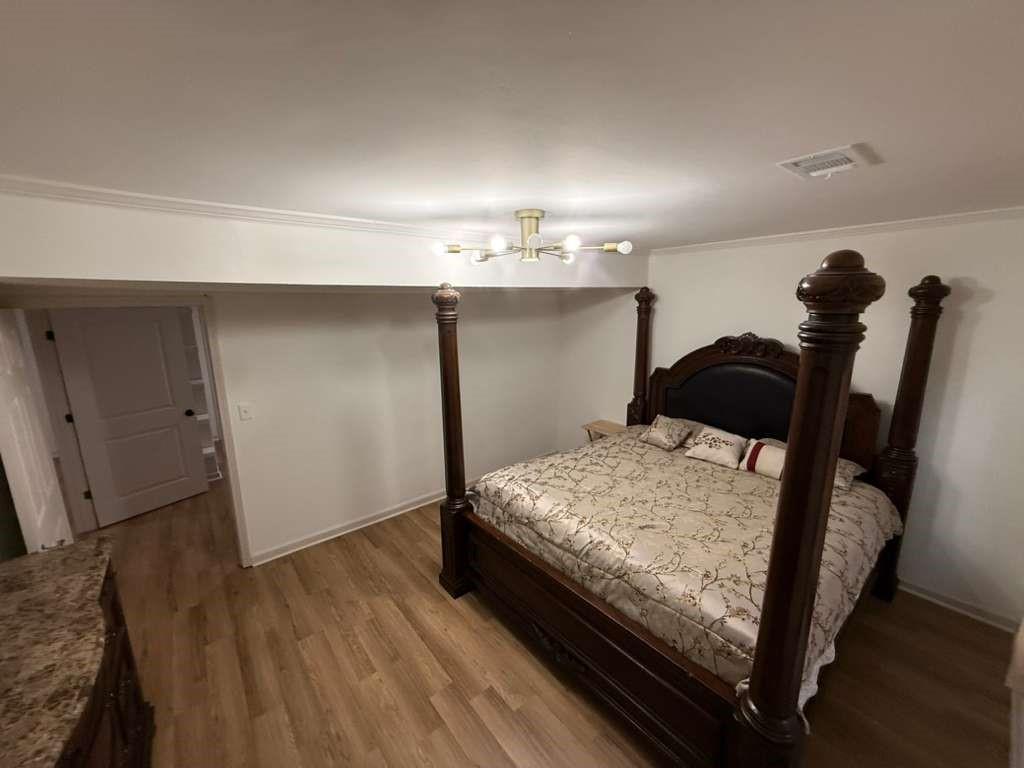 1463 Kellogg Creek Road Acworth, GA 30102 - Photo 28 of 55 a bedroom with bed and window