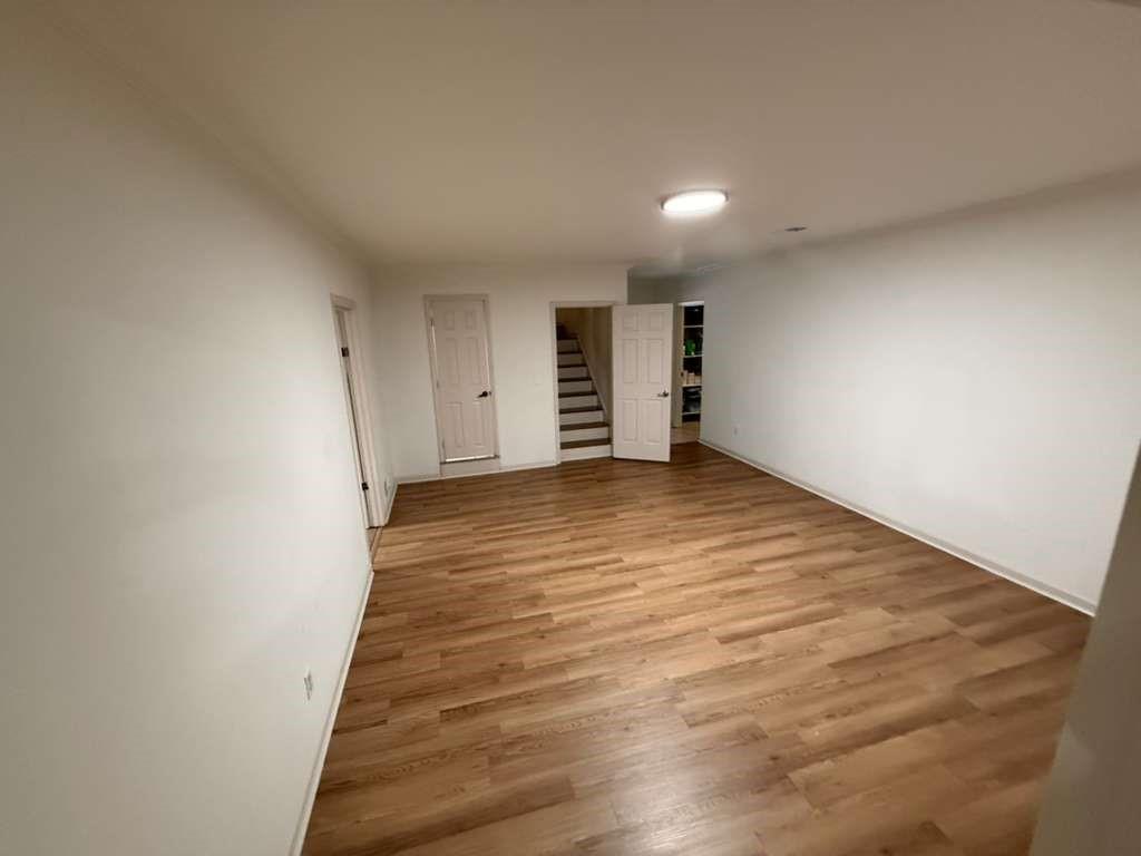 1463 Kellogg Creek Road Acworth, GA 30102 - Photo 30 of 55 a view of a room with wooden floor
