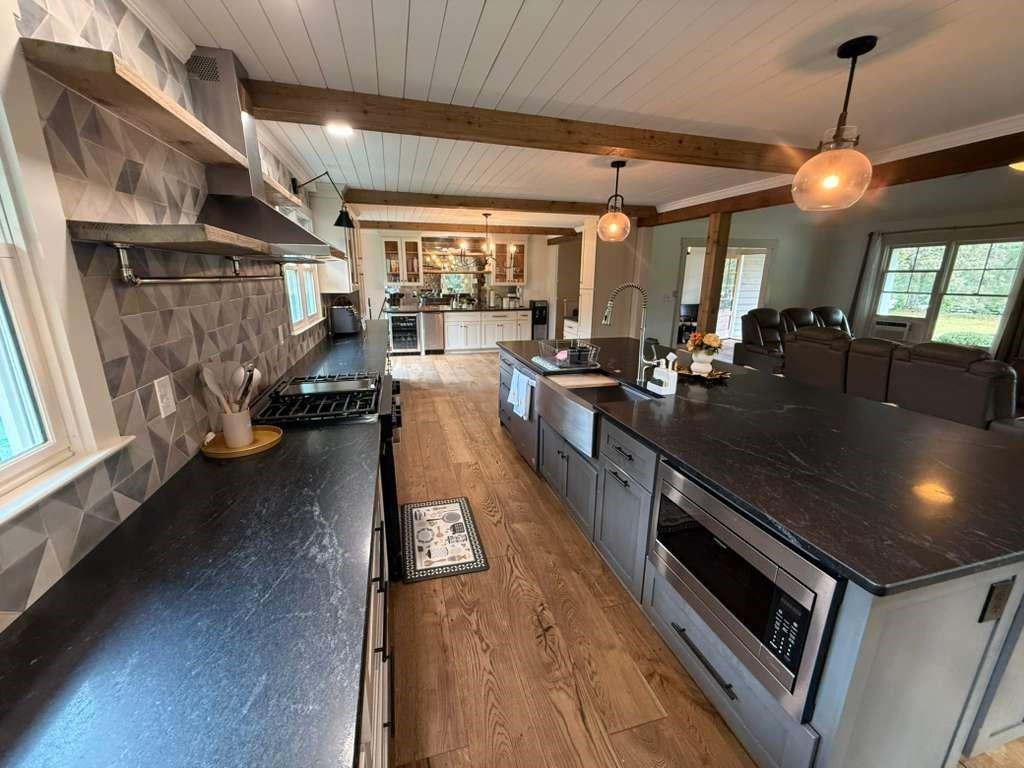 1463 Kellogg Creek Road Acworth, GA 30102 - Photo 40 of 55 a kitchen with sink refrigerator and window