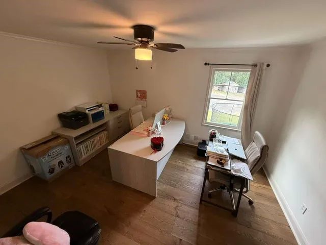 a bedroom with a bed and dresser