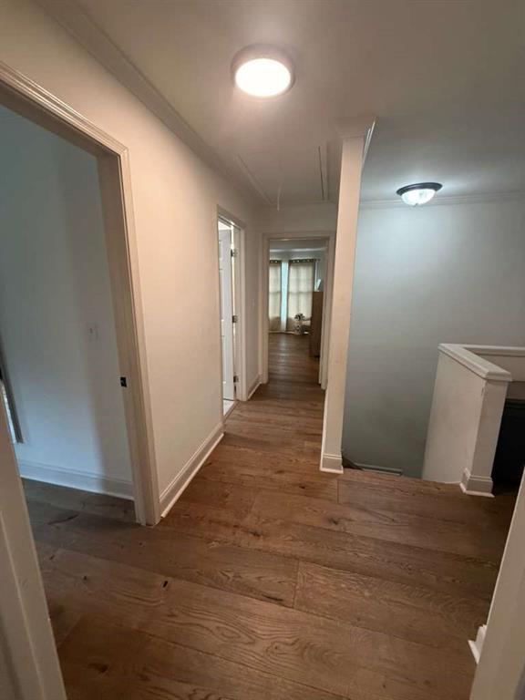 1463 Kellogg Creek Road Acworth, GA 30102 - Photo 47 of 55 an empty room with closet and wooden floor