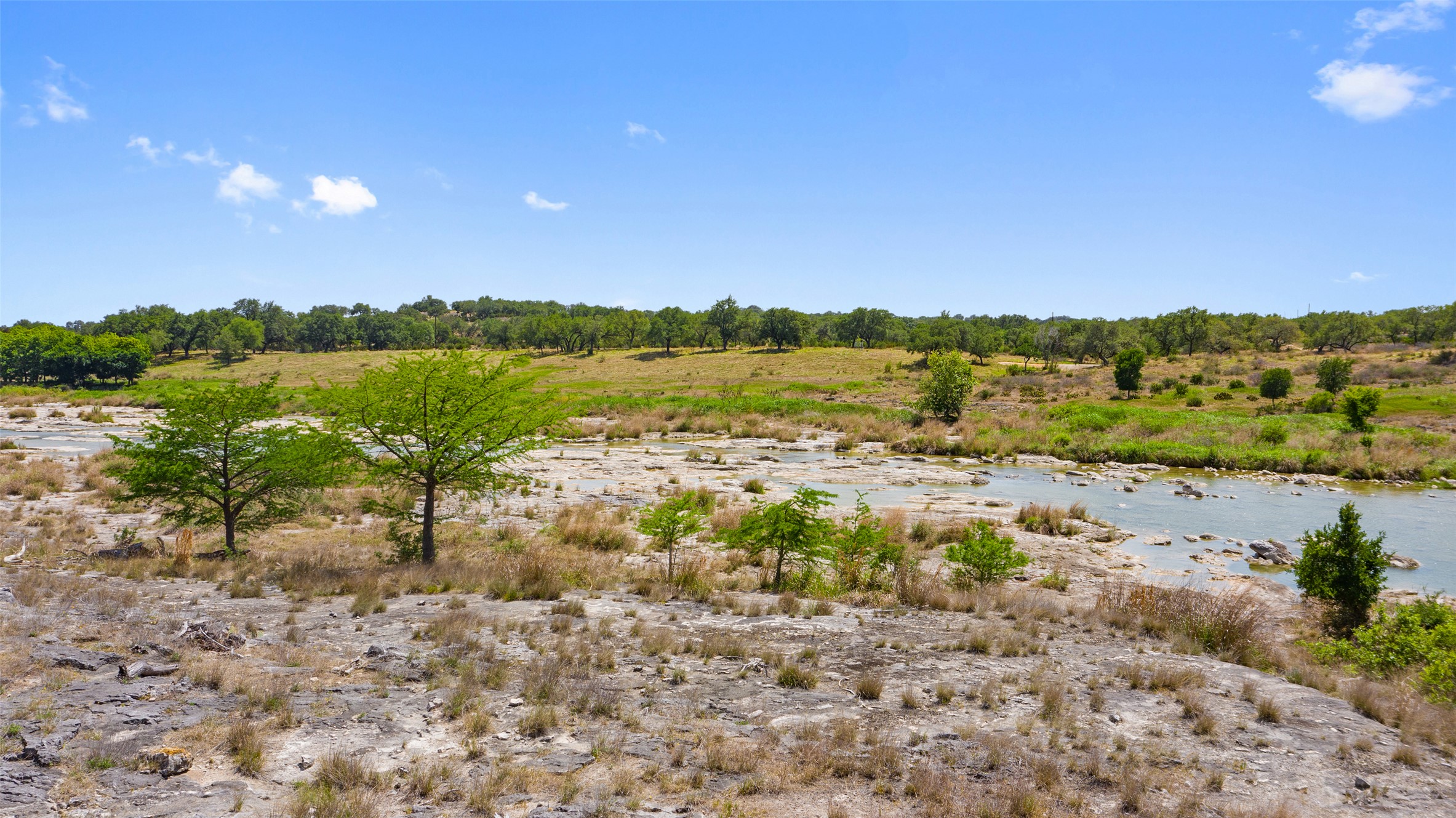 153 One River Point West Johnson City, TX 78636 - Photo 6 of 10 a view of lake with mountain