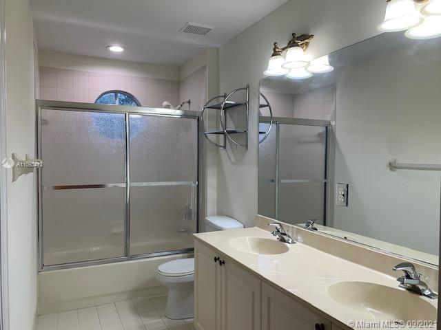 Silver Shores Miramar, FL 33027 - Photo 11 of 21 a bathroom with a sink toilet and shower
