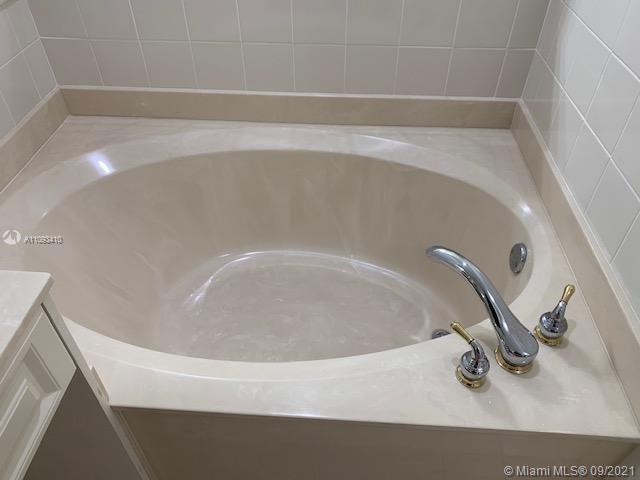 Silver Shores Miramar, FL 33027 - Photo 15 of 21 a bathroom with a sink