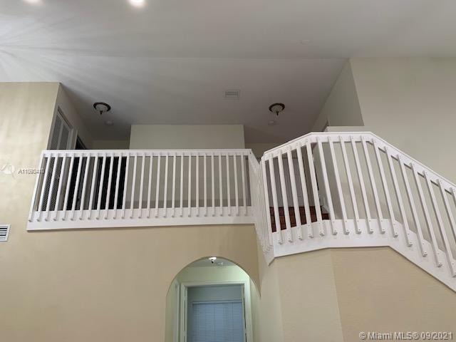 Silver Shores Miramar, FL 33027 - Photo 18 of 21 a view of a bedroom with wooden floor