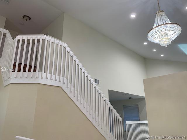 Silver Shores Miramar, FL 33027 - Photo 19 of 21 a view of a hallway with entryway