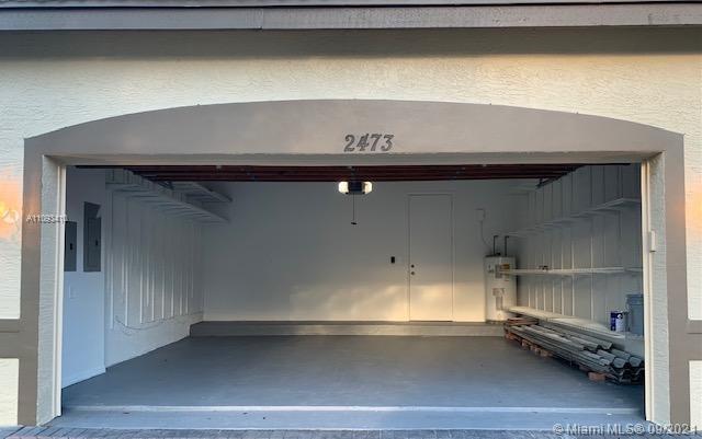 Silver Shores Miramar, FL 33027 - Photo 4 of 21 a refrigerator sitting inside of a kitchen