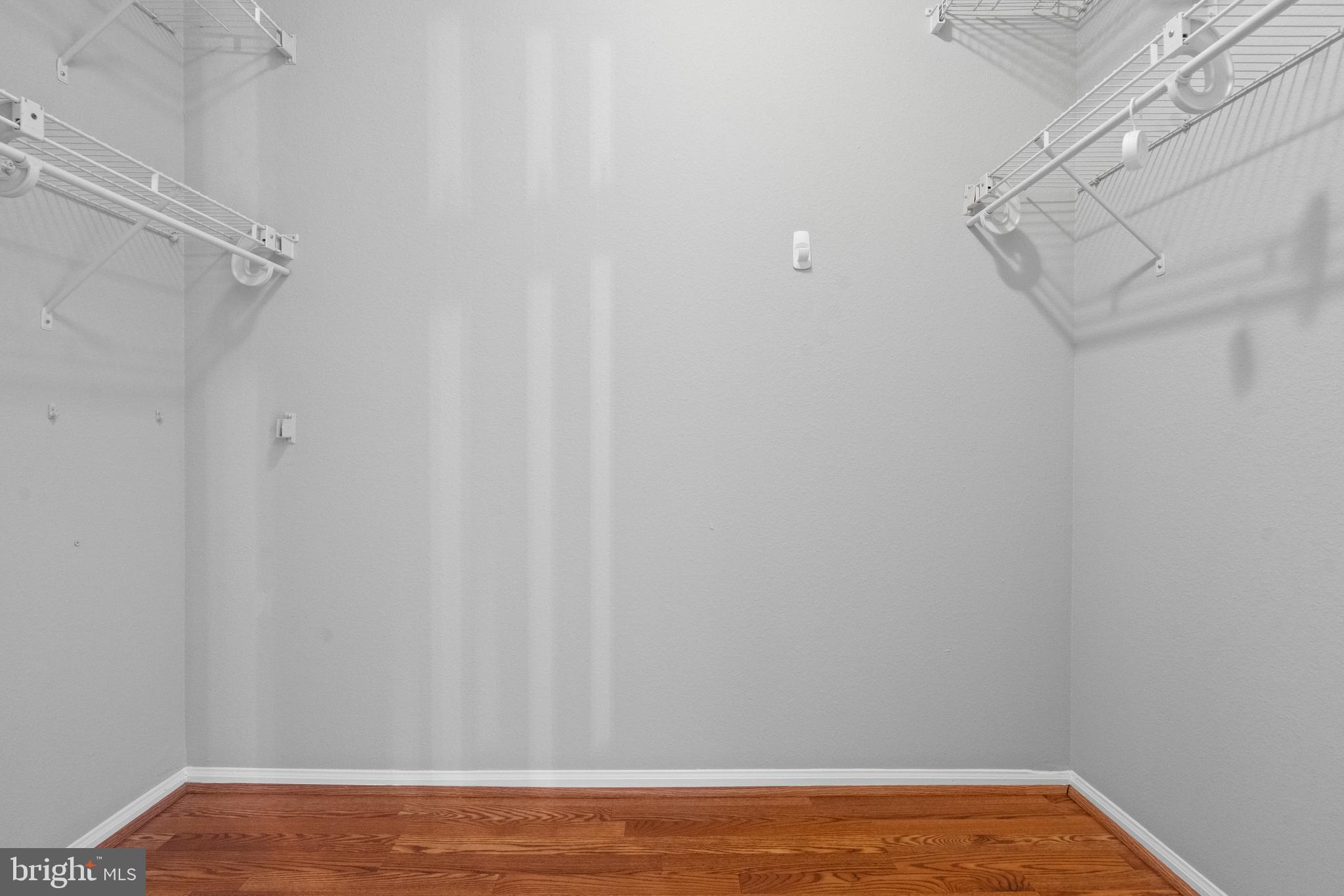 1550 Spring Gate Dr., Unit 8209 McLean, VA 22102 - Photo 17 of 40 a view of a room with racks on the wall