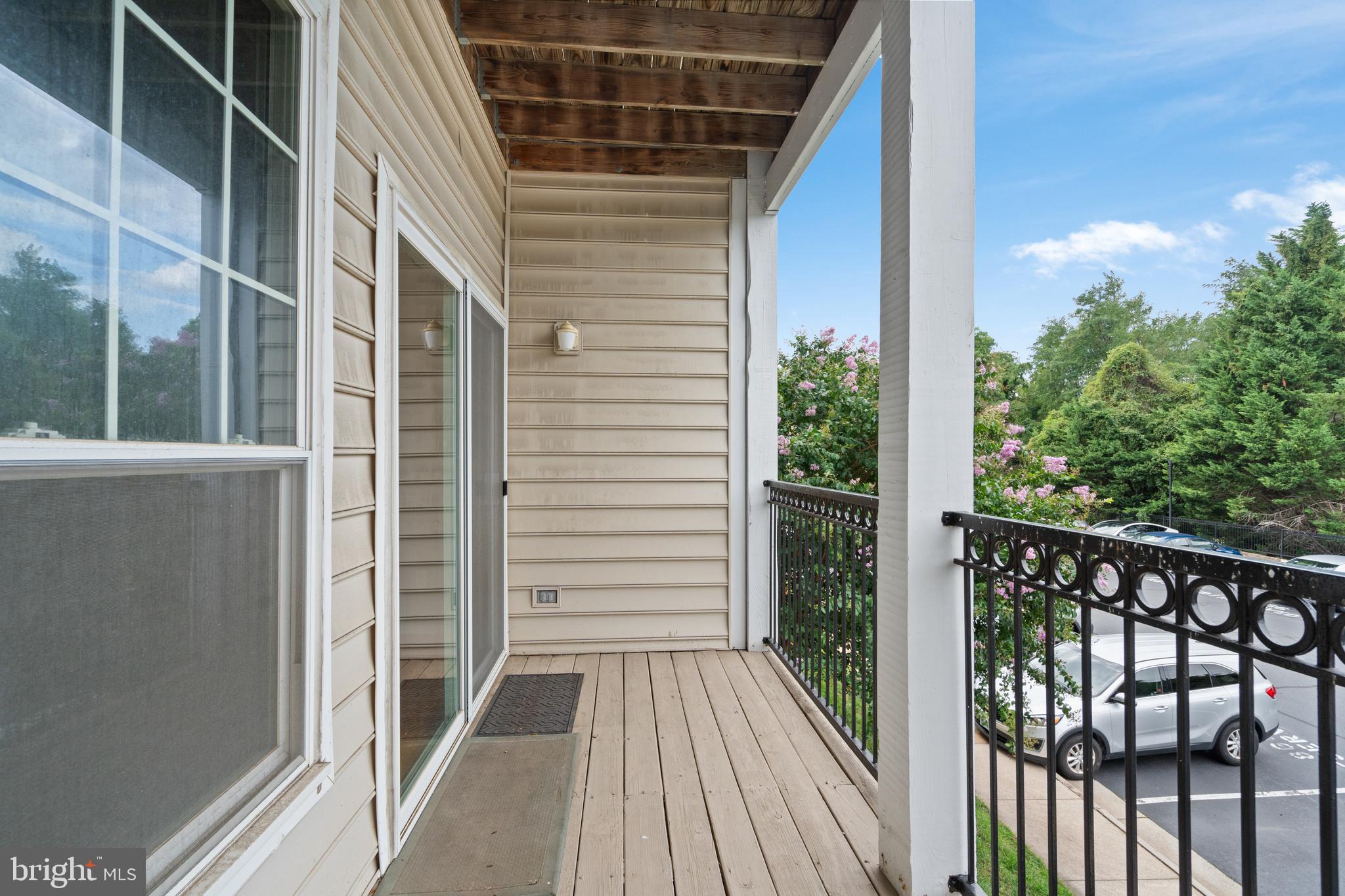 1550 Spring Gate Dr., Unit 8209 McLean, VA 22102 - Photo 24 of 40 a view of a balcony with wooden floor