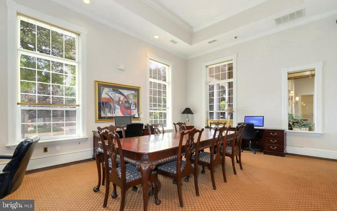 1550 Spring Gate Dr., Unit 8209 McLean, VA 22102 - Photo 27 of 40 a view of a dining room with furniture window and outside view