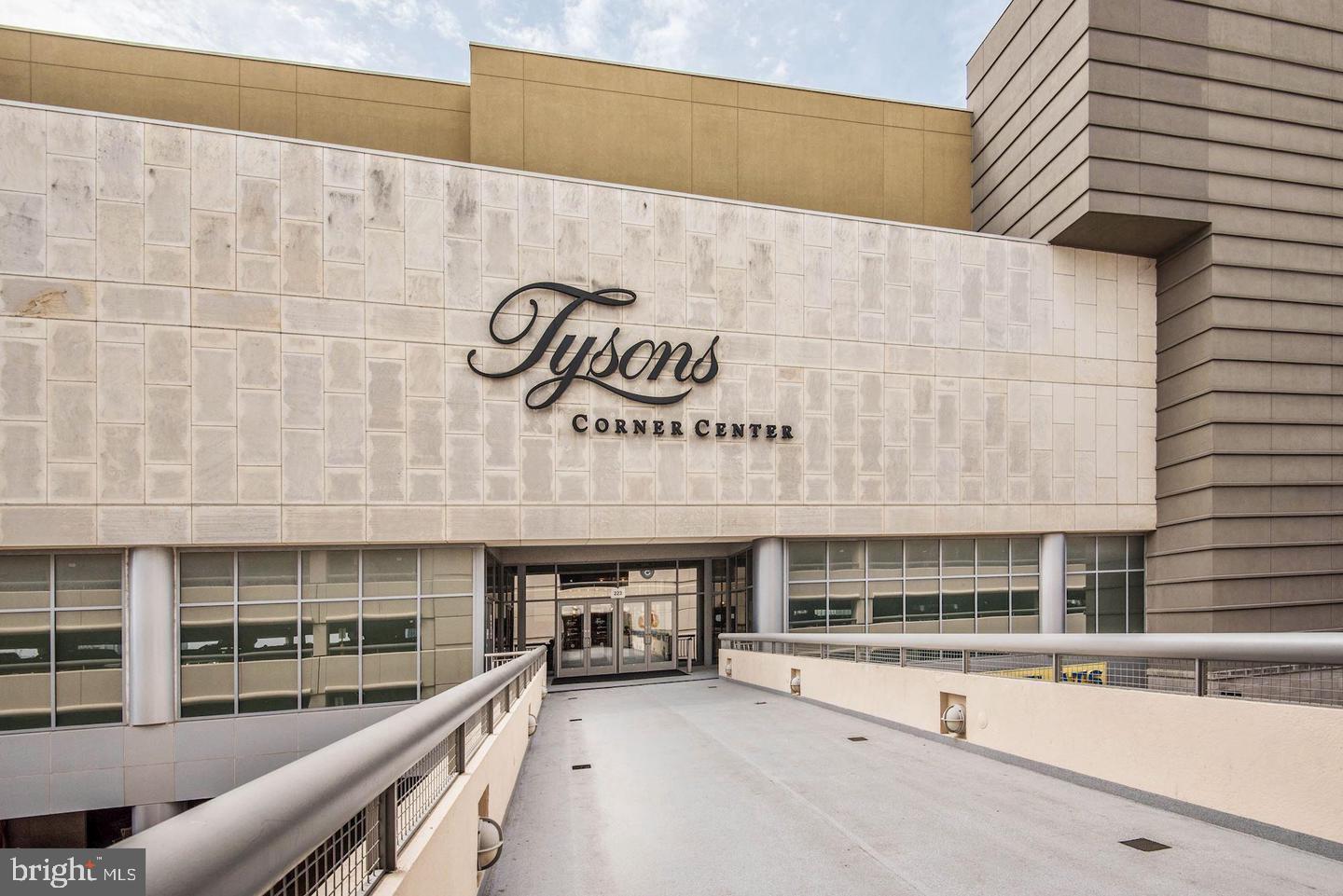 1550 Spring Gate Dr., Unit 8209 McLean, VA 22102 - Photo 38 of 40 a view of a kitchen with stainless steel appliances granite countertop a stove and cabinets
