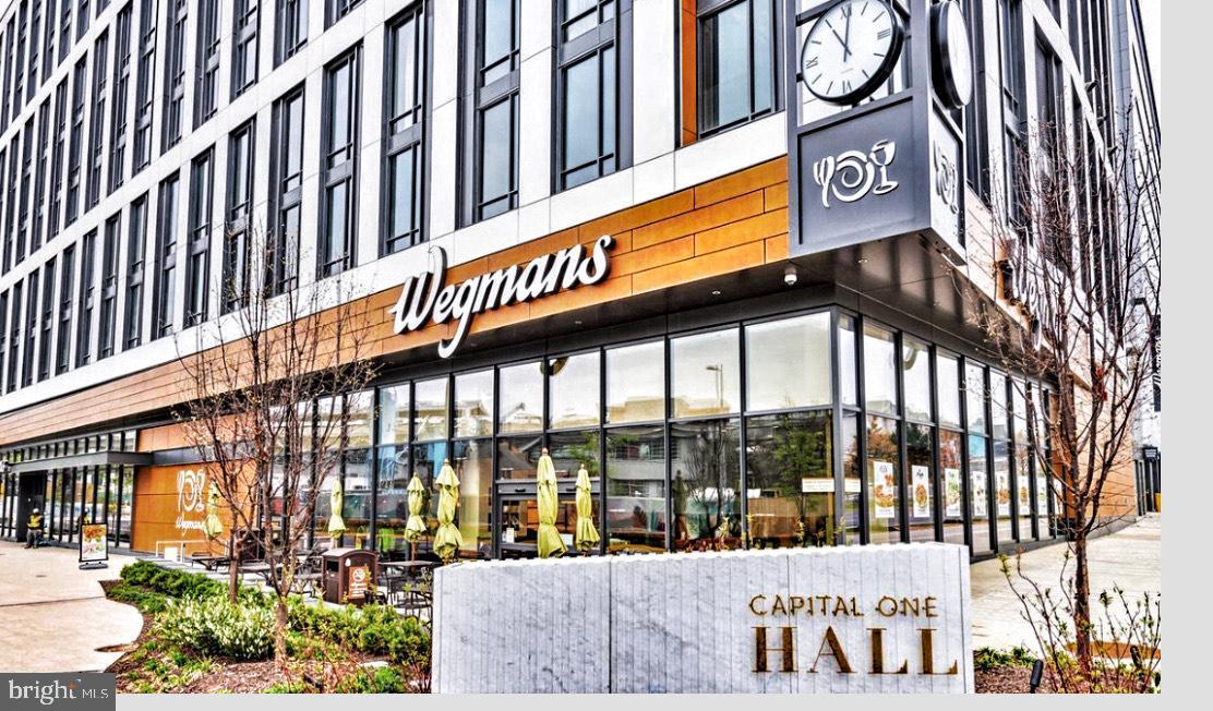 1550 Spring Gate Dr., Unit 8209 McLean, VA 22102 - Photo 39 of 40 a view of a building with a street sign