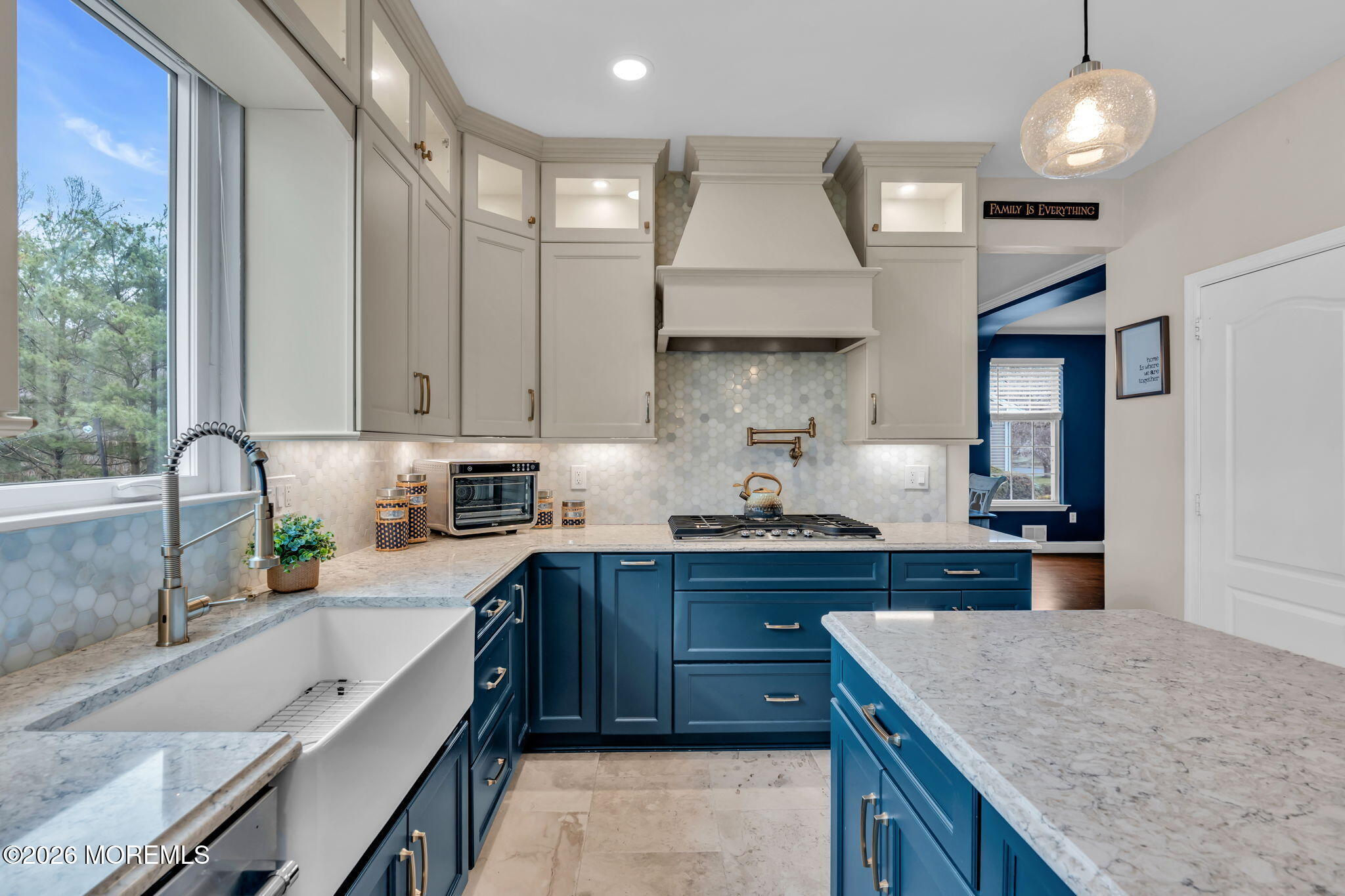 41 Lafayette Mills Road Manalapan, NJ 07726 - Photo 16 of 75 a kitchen with stainless steel appliances granite countertop a sink a stove and a wooden cabinets