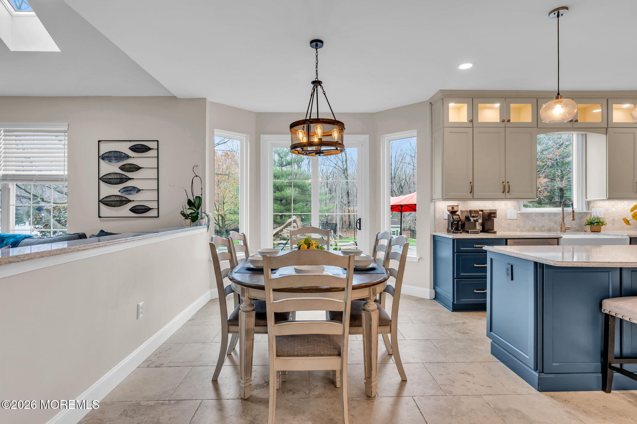 41 Lafayette Mills Road Manalapan, NJ 07726 - Photo 19 of 75 a dining room with furniture a chandelier and window