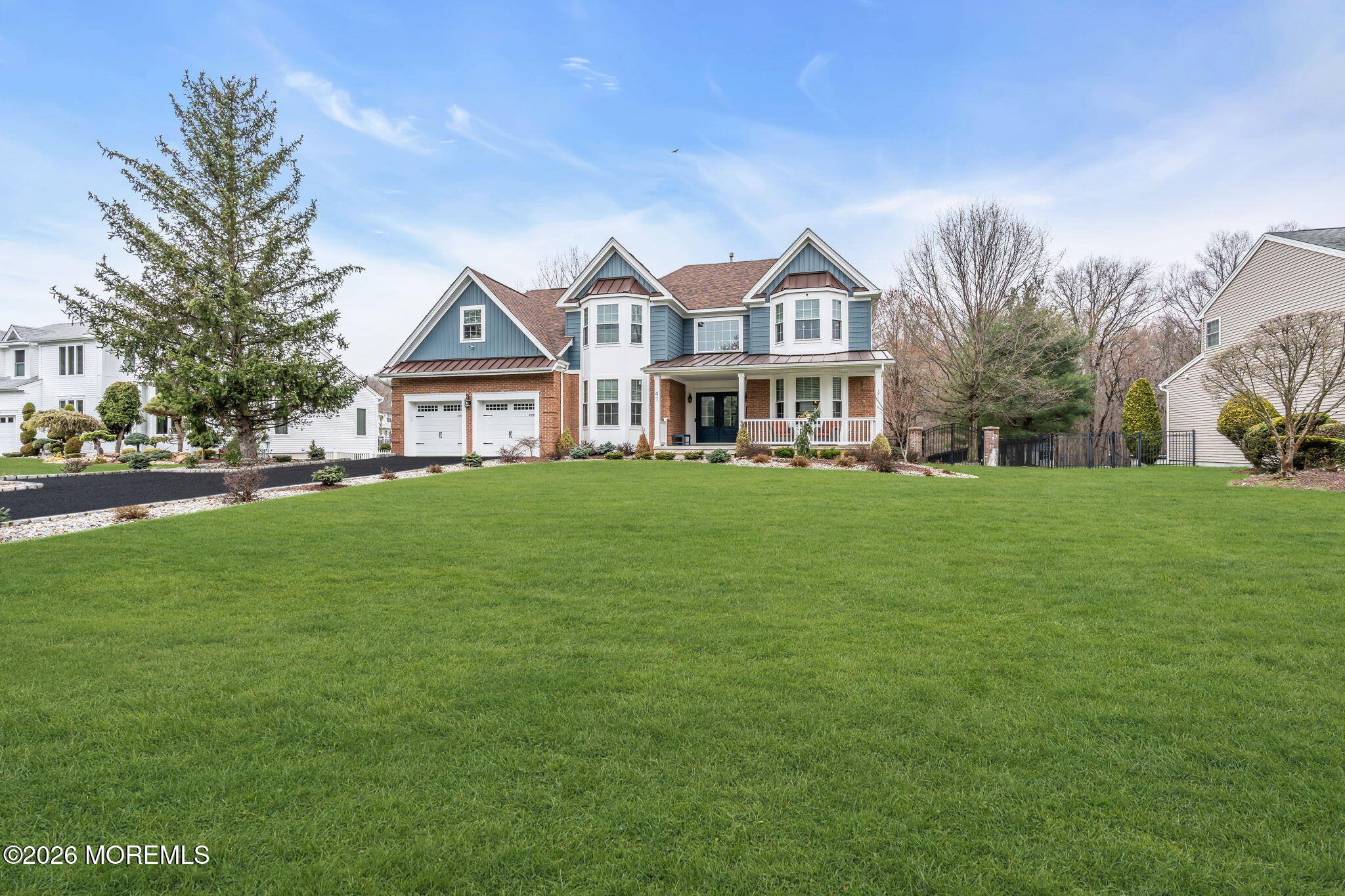 41 Lafayette Mills Road Manalapan, NJ 07726 - Photo 2 of 75 a front view of a house with a yard