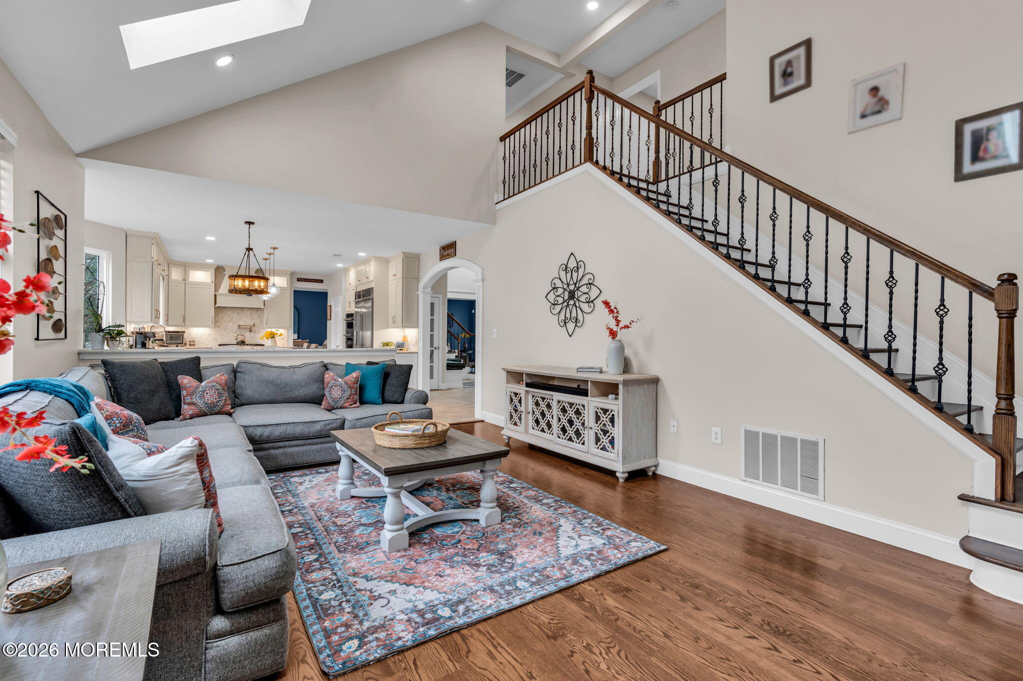 41 Lafayette Mills Road Manalapan, NJ 07726 - Photo 25 of 75 a living room with furniture or stairs and a wooden floor
