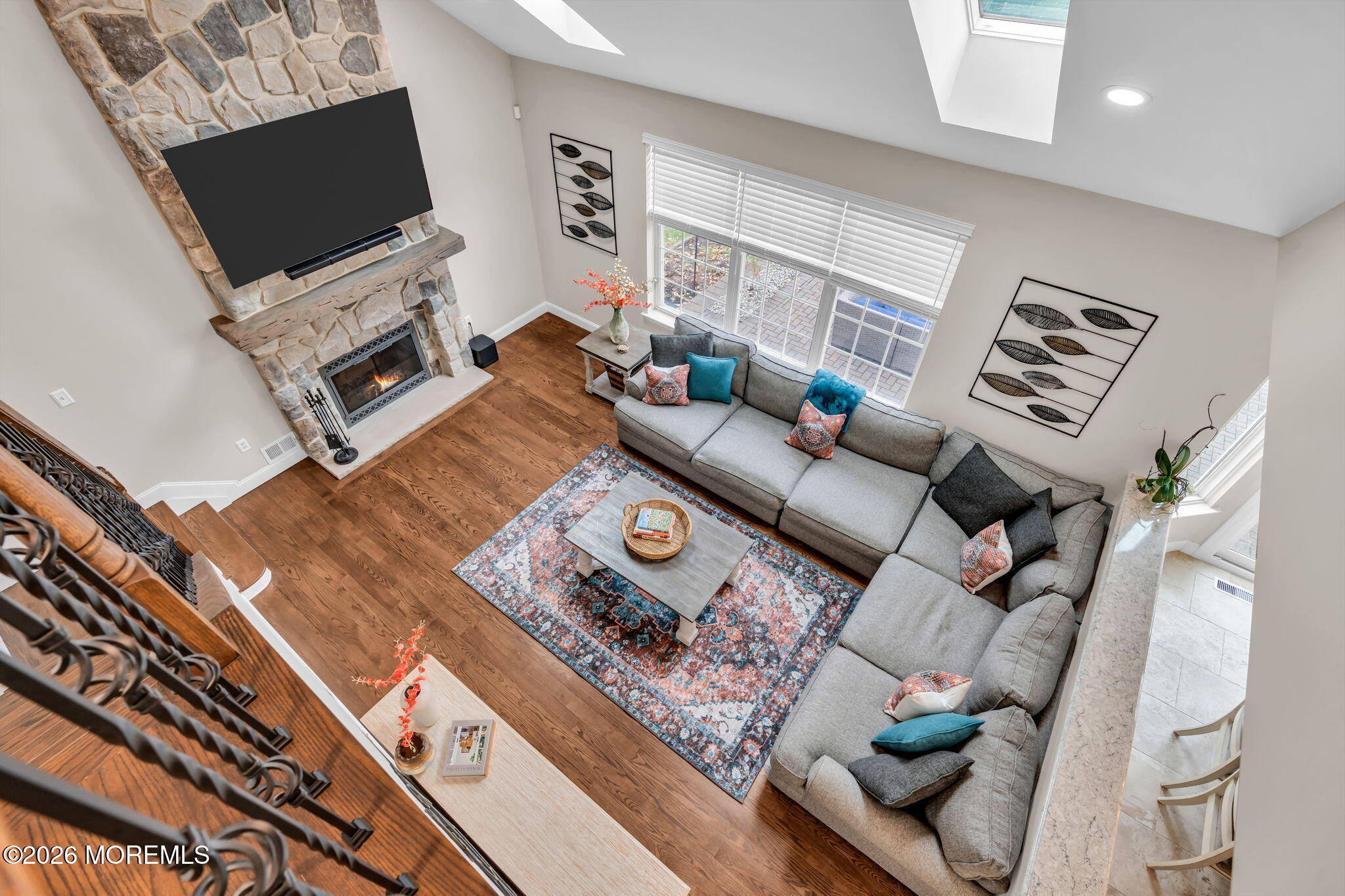 41 Lafayette Mills Road Manalapan, NJ 07726 - Photo 26 of 75 a living room with furniture and a flat screen tv