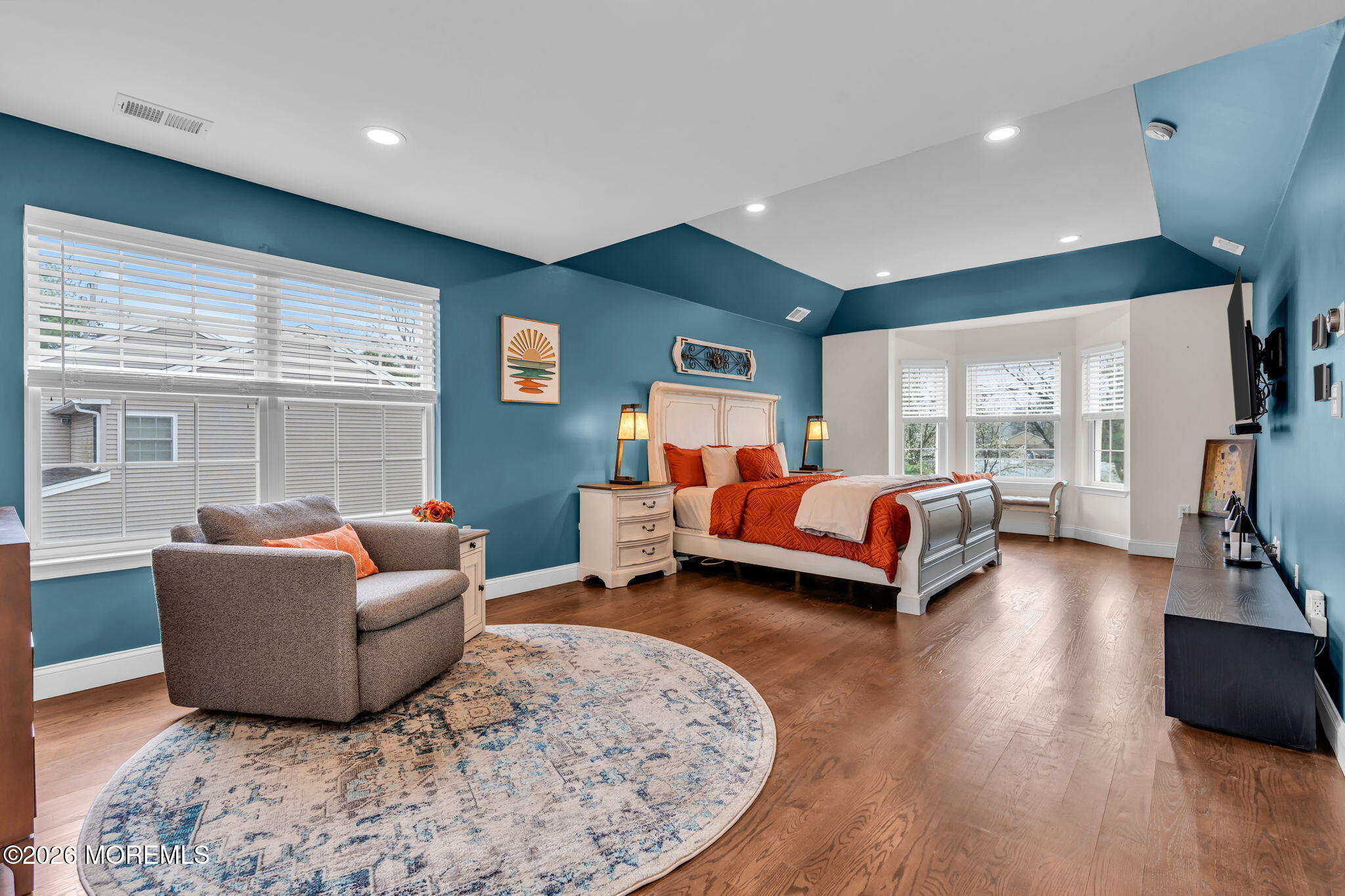 41 Lafayette Mills Road Manalapan, NJ 07726 - Photo 31 of 75 a living room with furniture and a flat screen tv