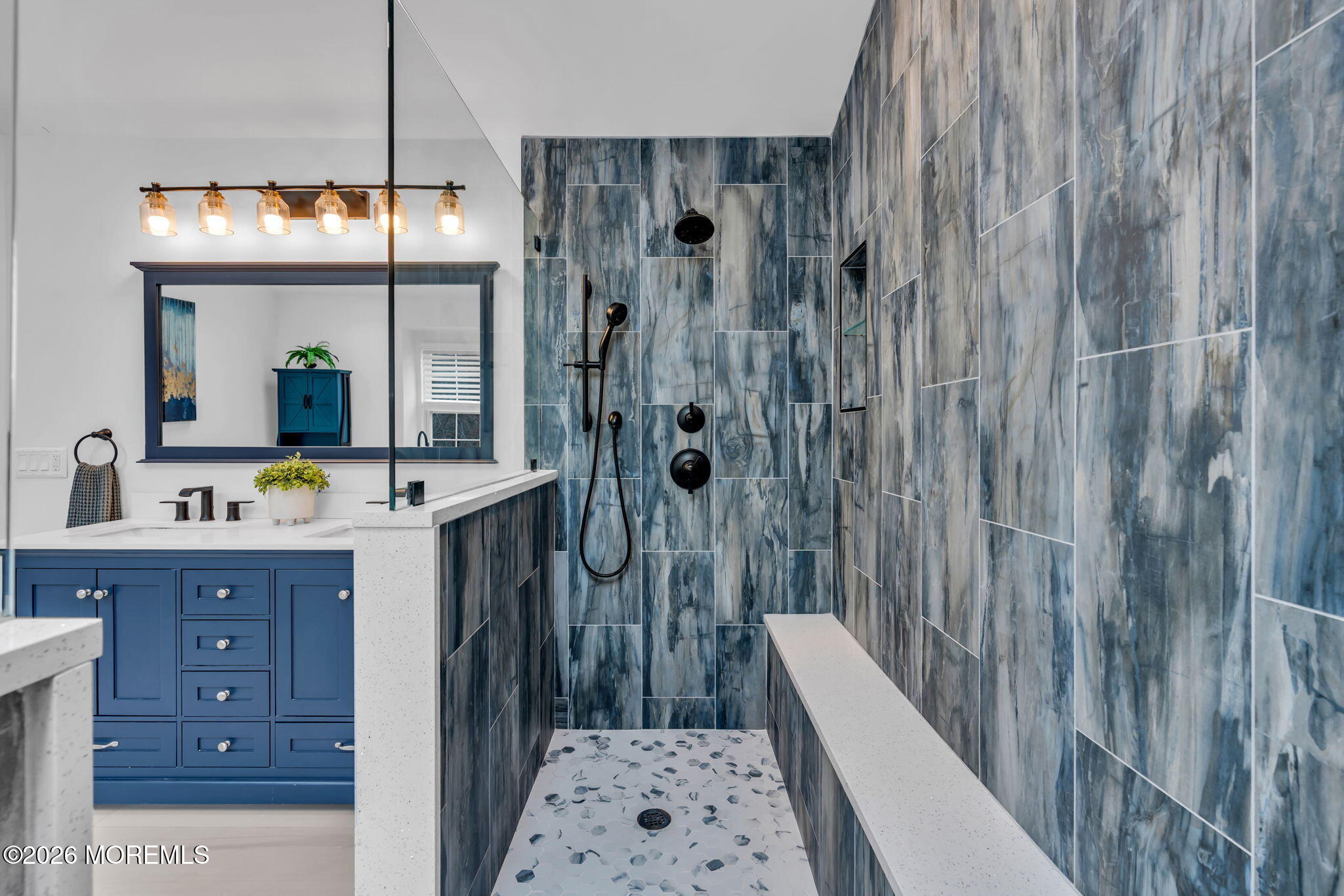 41 Lafayette Mills Road Manalapan, NJ 07726 - Photo 40 of 75 a bathroom with a double vanity sink a toilet a mirror and shower