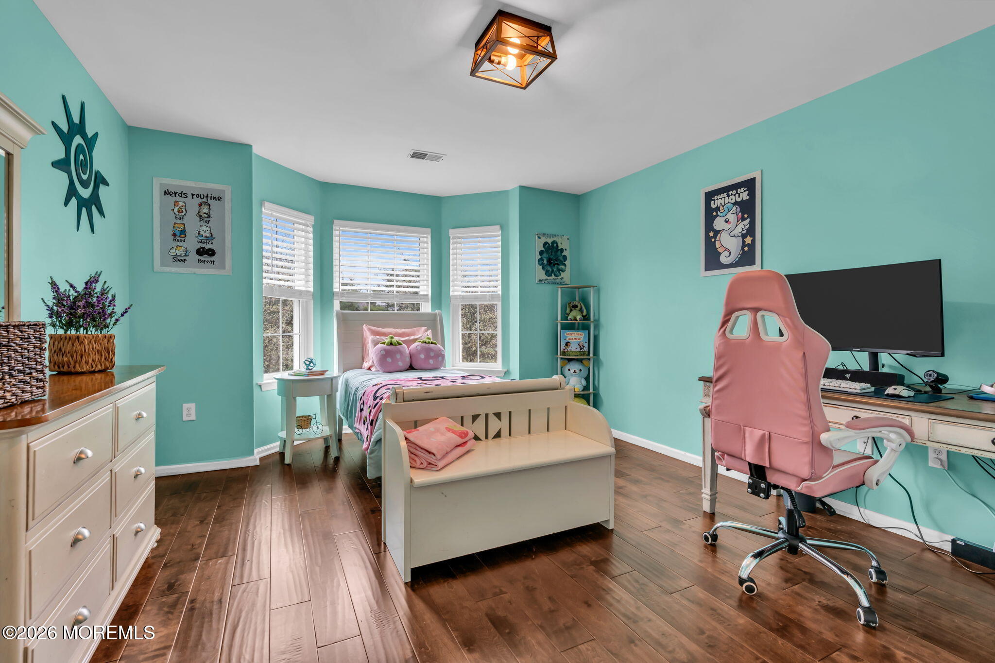 41 Lafayette Mills Road Manalapan, NJ 07726 - Photo 41 of 75 a living room with furniture and a flat screen tv