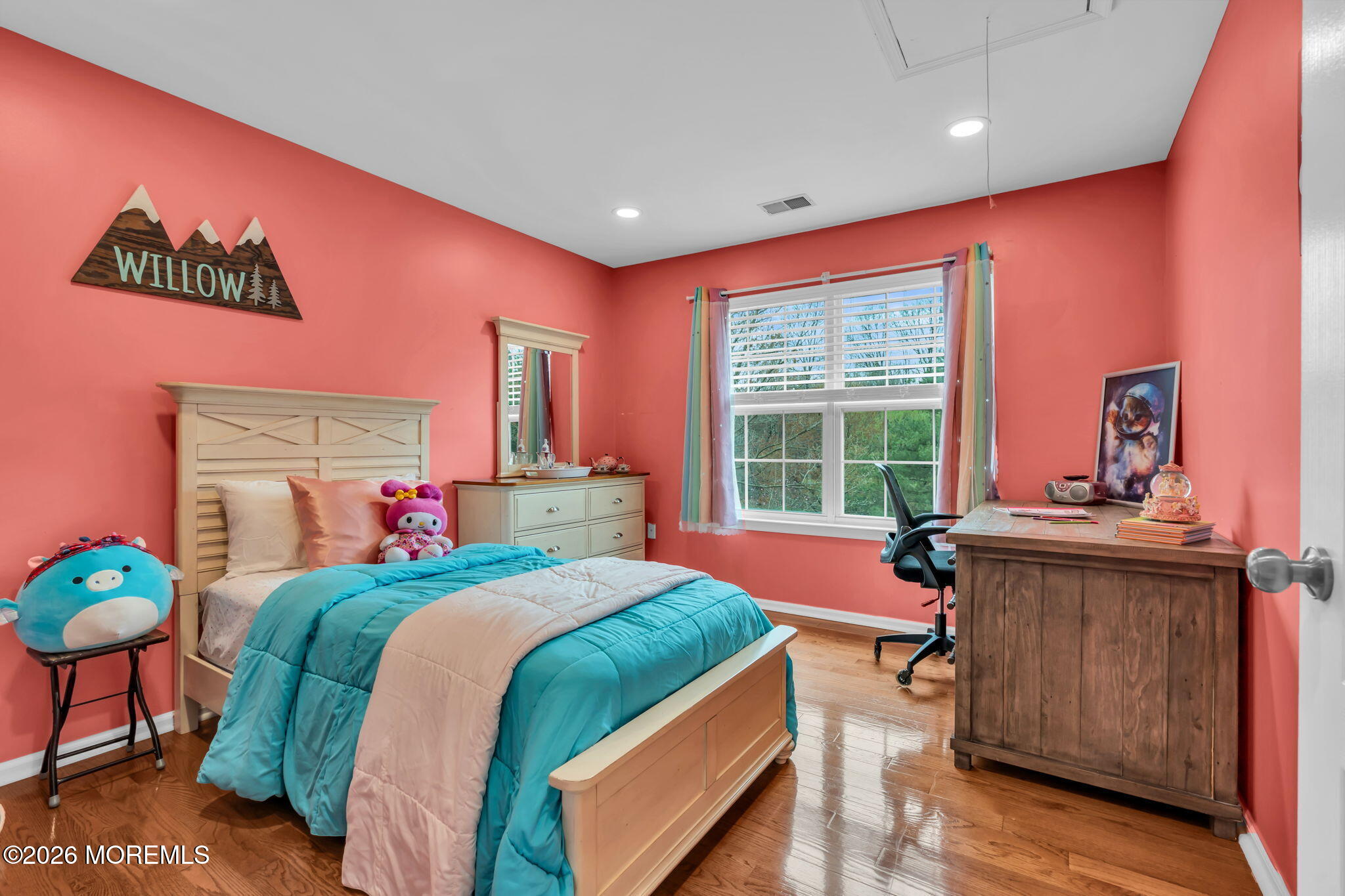 41 Lafayette Mills Road Manalapan, NJ 07726 - Photo 42 of 75 a bed room with a bed and a chair