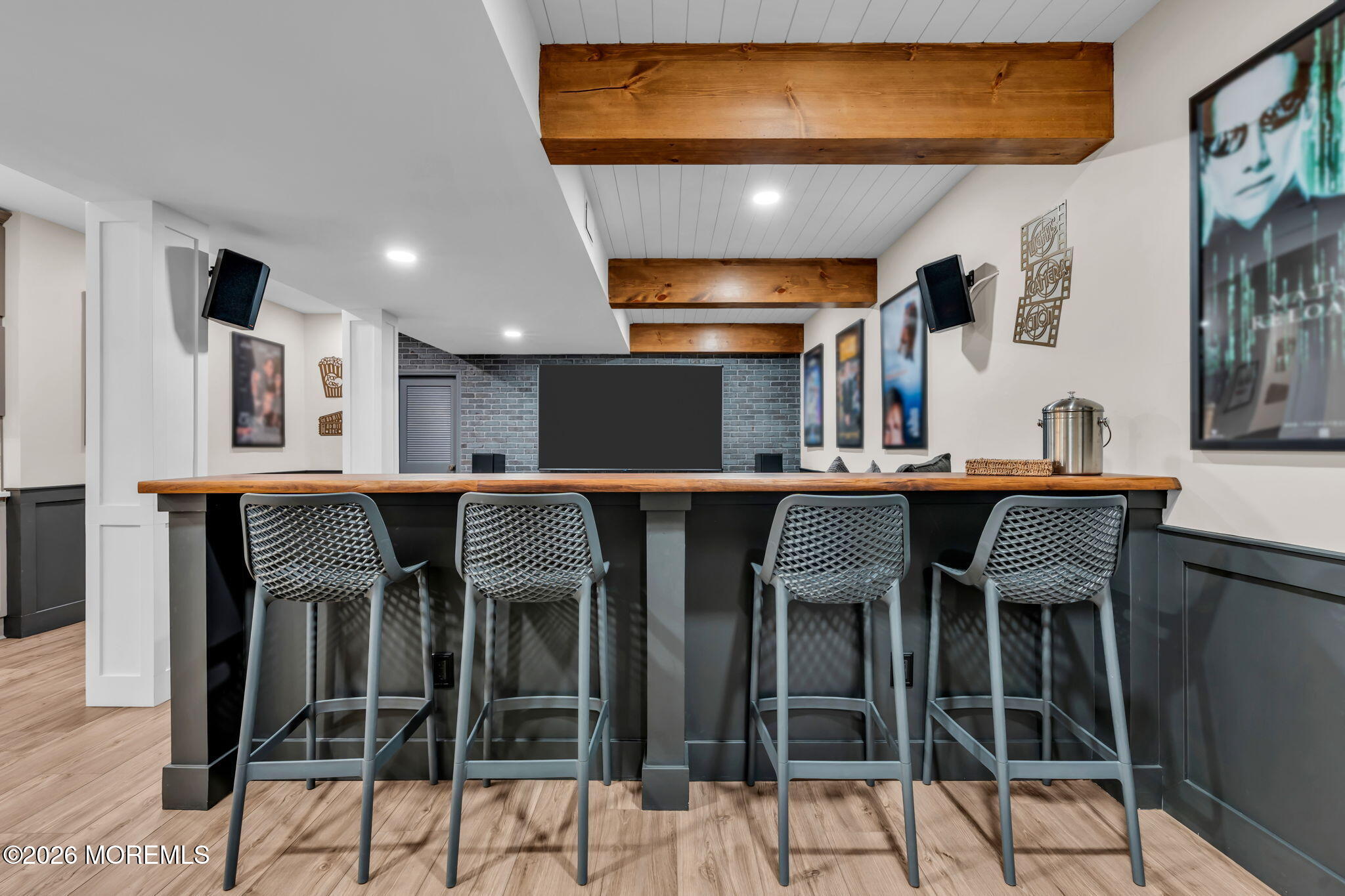 41 Lafayette Mills Road Manalapan, NJ 07726 - Photo 55 of 75 a kitchen with stainless steel appliances kitchen island granite countertop a table chairs in it and wooden floors