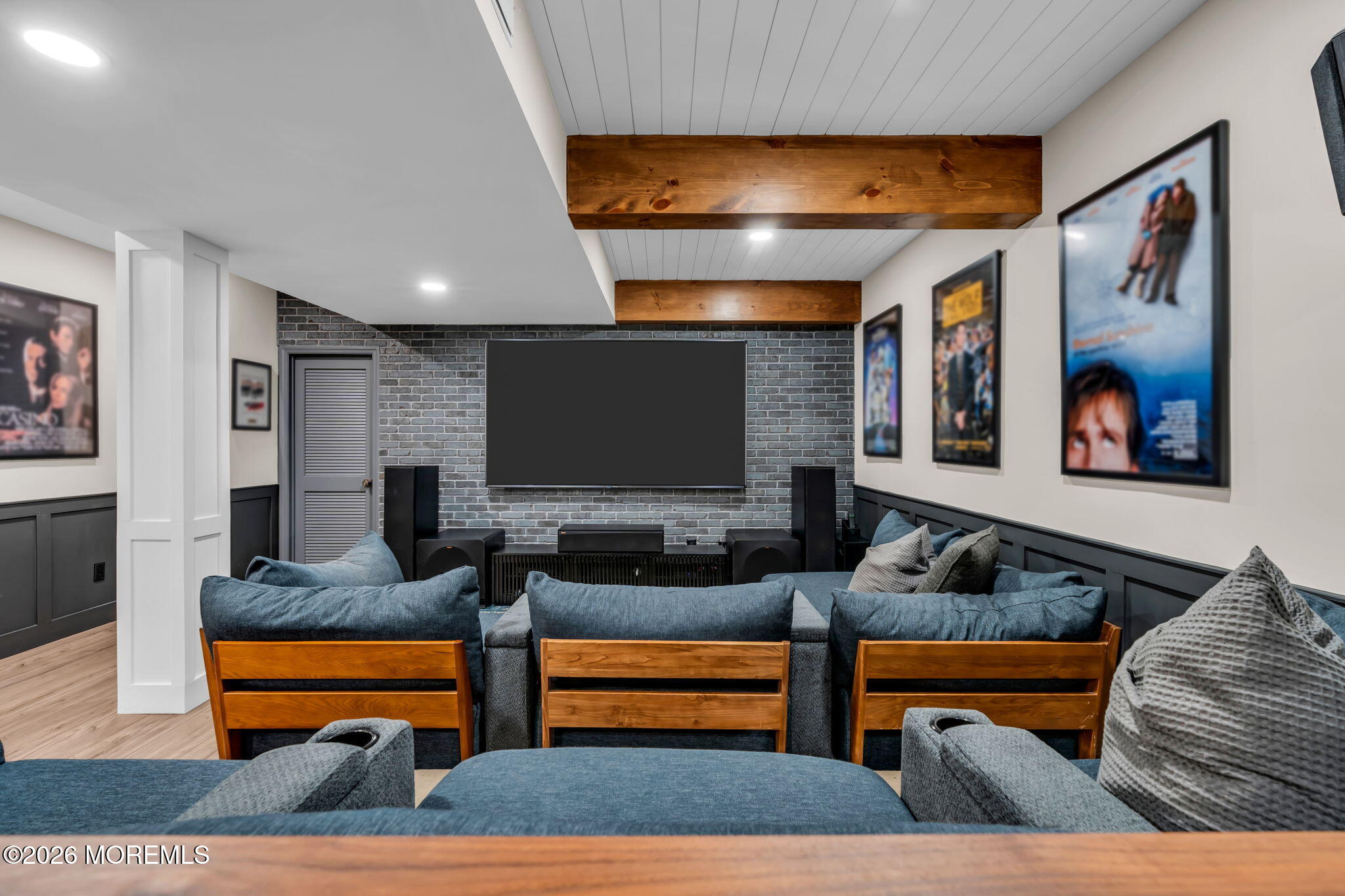 41 Lafayette Mills Road Manalapan, NJ 07726 - Photo 57 of 75 a living room with furniture and a flat screen tv