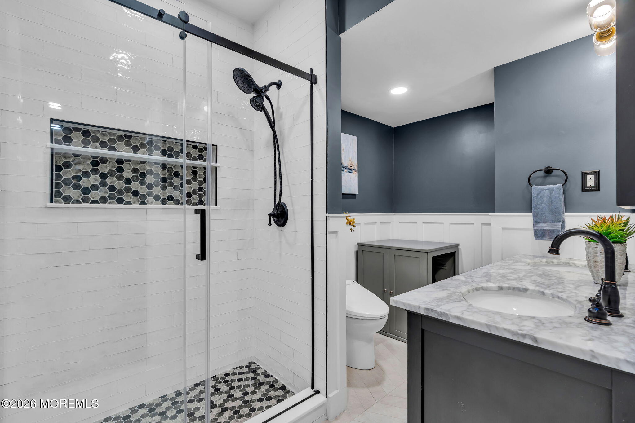 41 Lafayette Mills Road Manalapan, NJ 07726 - Photo 60 of 75 a bathroom with a granite countertop sink a toilet and shower