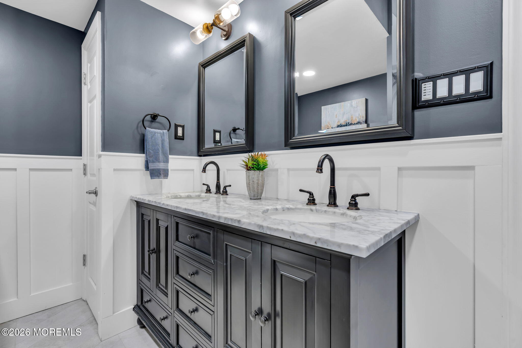 41 Lafayette Mills Road Manalapan, NJ 07726 - Photo 61 of 75 a bathroom with a sink and a mirror