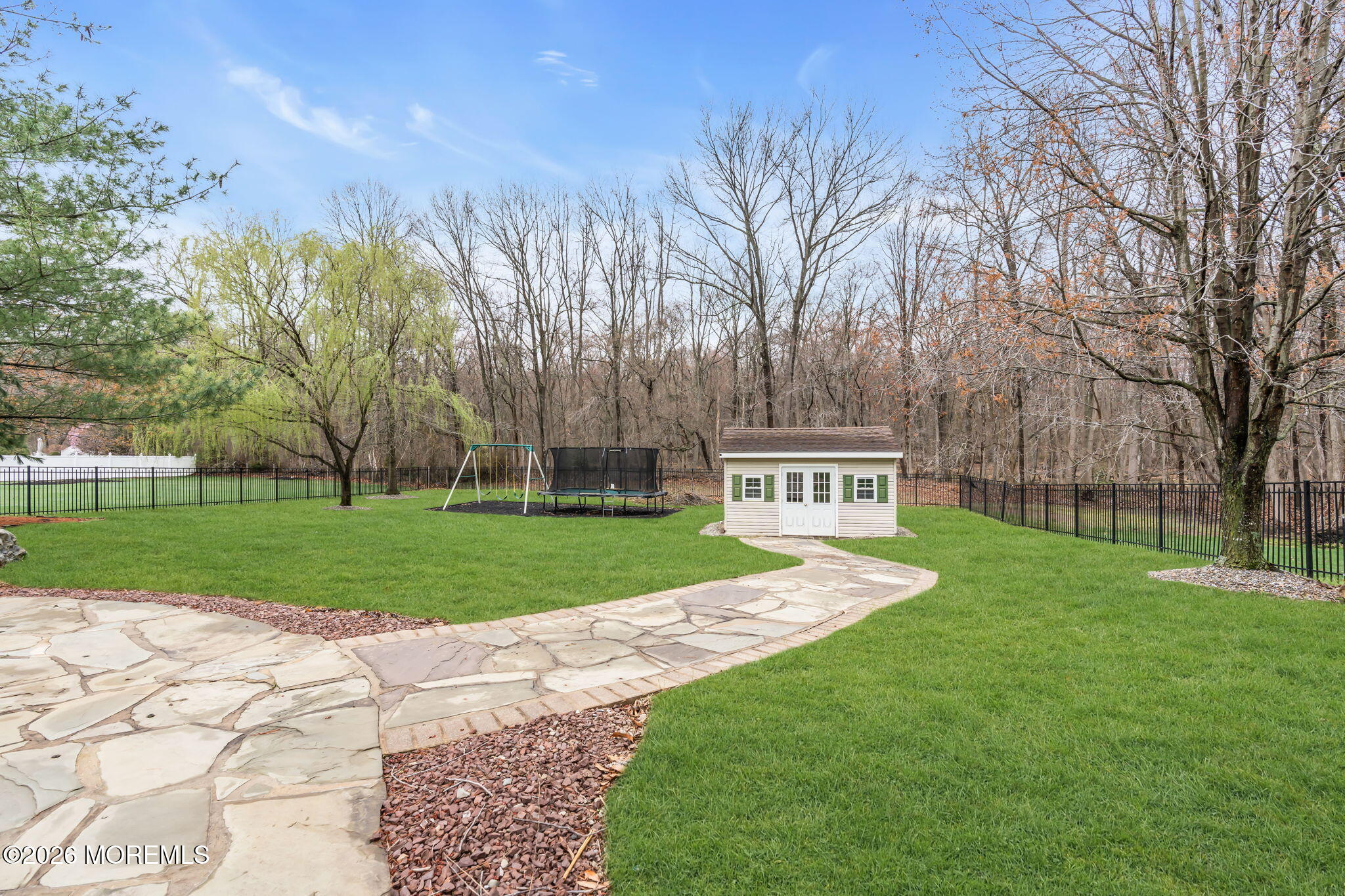 41 Lafayette Mills Road Manalapan, NJ 07726 - Photo 71 of 75 a view of a house with a yard