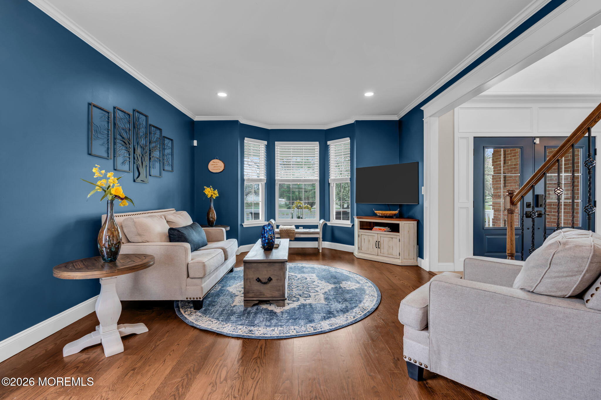 41 Lafayette Mills Road Manalapan, NJ 07726 - Photo 9 of 75 a living room with furniture and a flat screen tv