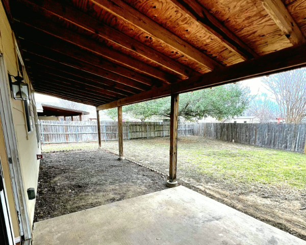 132 Stephen Lane Georgetown, TX 78626 - Photo 13 of 13 Fenced backyard with a patio area
