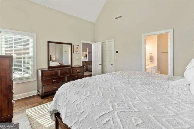 a bathroom with a sink double vanity shower and a mirror