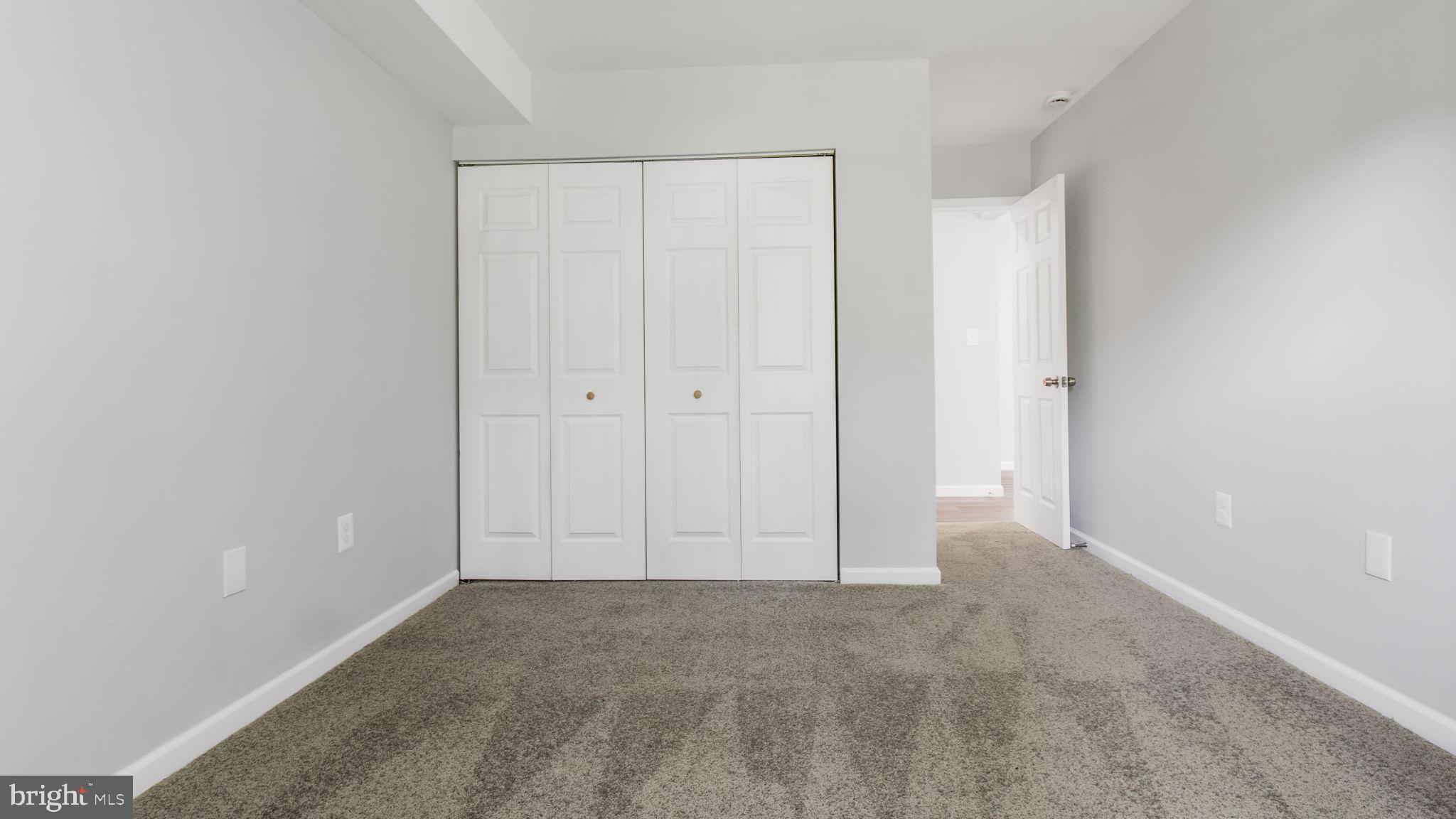 3851 St Barnabas Road, Unit 103 Suitland, MD 20746 - Photo 16 of 43 a view of an empty room