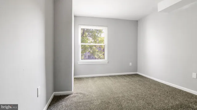 an empty room with a window