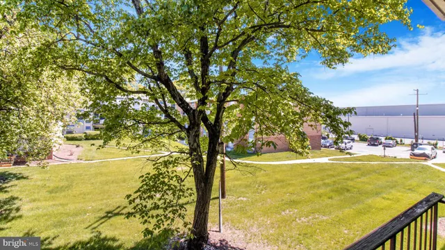 a view of a swimming pool with an outdoor space and seating area