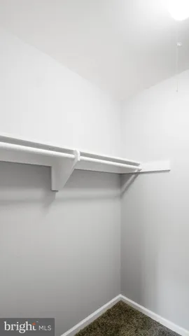 a view of small space with racks on the wall