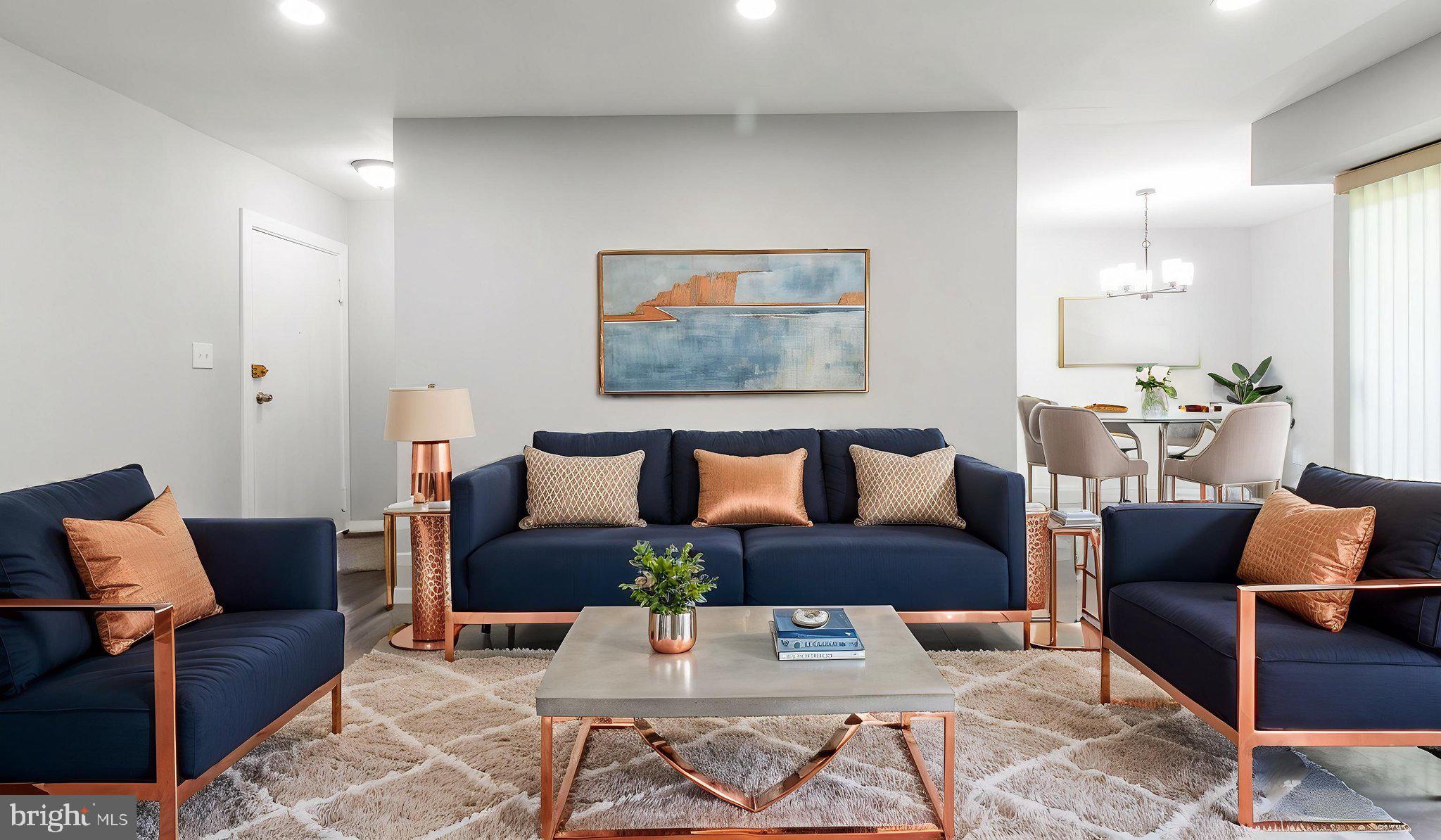 3851 St Barnabas Road, Unit 103 Suitland, MD 20746 - Photo 36 of 43 a living room with furniture and a painting