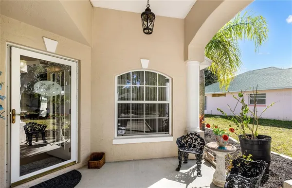 a livingroom with furniture and a window