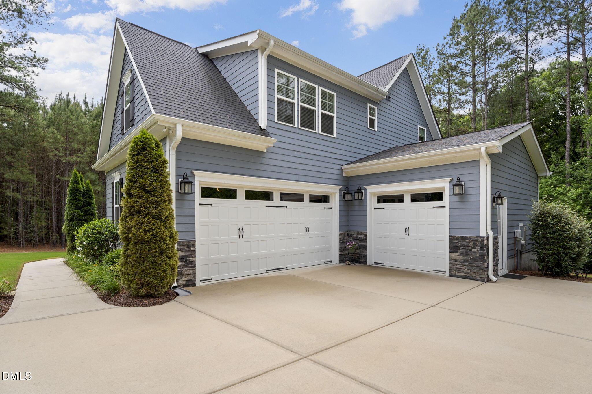 223 Colonial Ridge Drive Pittsboro, NC 27312 - Photo 33 of 47 a front view of a house with a garage