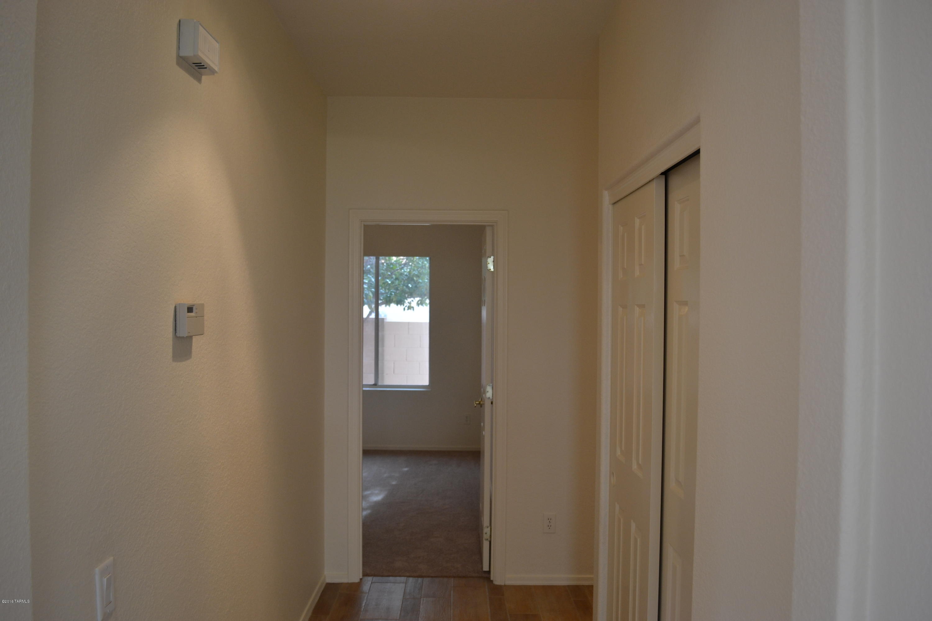 5640 North Cherokee Ridge Road Tucson, AZ 85750 - Photo 18 of 39 a view of a room that has a window in it