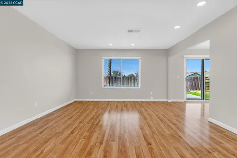 a view of an empty room and window