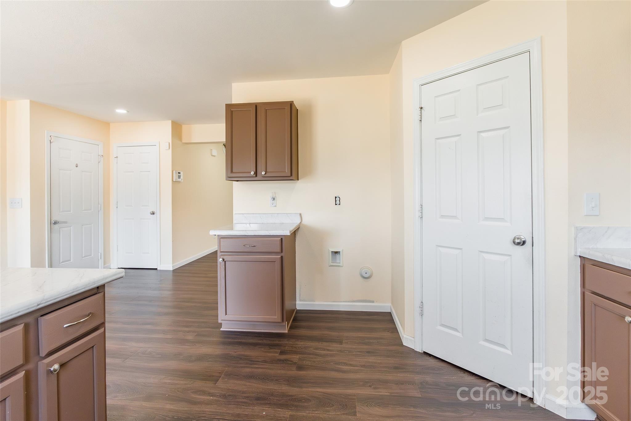 2357 Riding Trail Road Gastonia, NC 28054 - Photo 12 of 32 a kitchen with a refrigerator and a sink