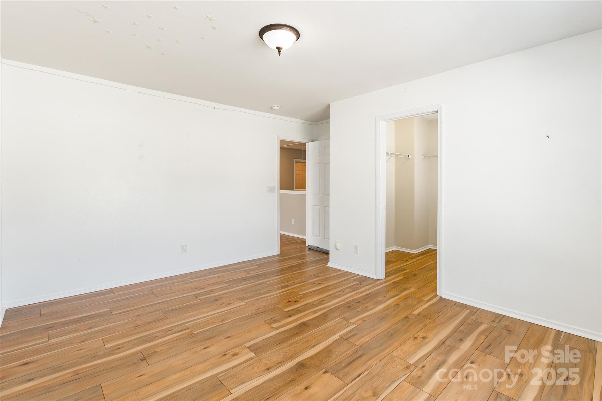 2357 Riding Trail Road Gastonia, NC 28054 - Photo 25 of 32 a view of empty room with wooden floor